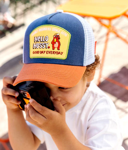 Casquette enfant bleu blanc visière orange patch animal Hello Hossy