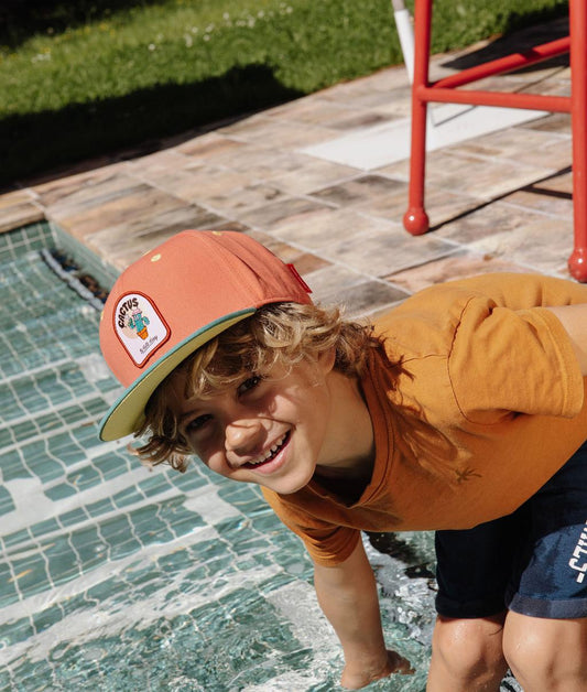 Casquette enfant orange visière plate patch Hello Hossy