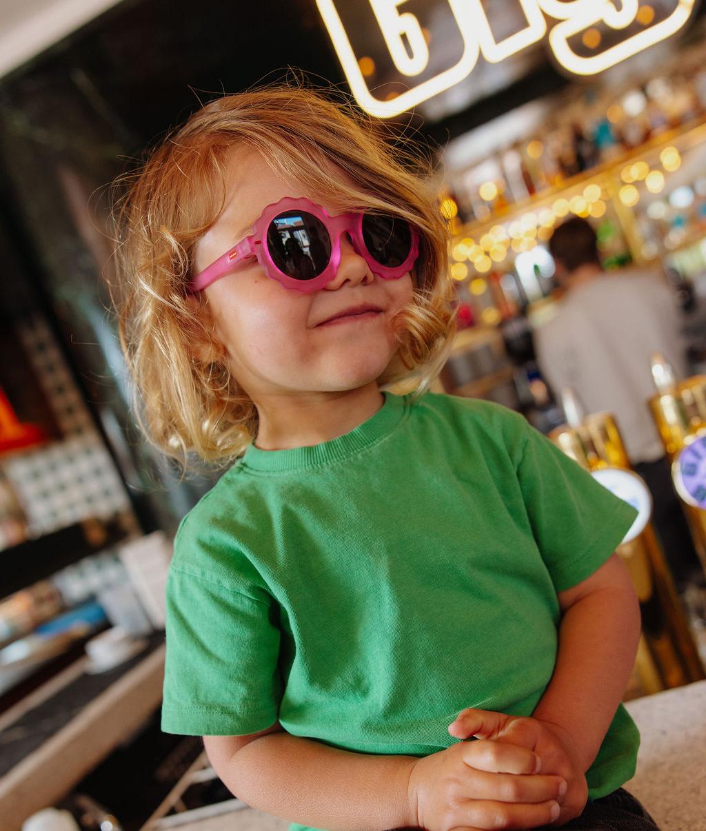 Lunettes de soleil enfant fuchsia forme fleur verres foncés Hello Hossy