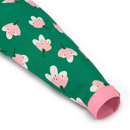 Manche poncho de pluie enfant vert imprimé fleurs poignet rose Hello Hossy