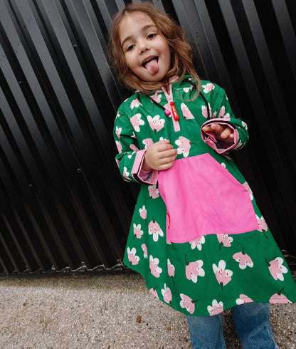 Poncho enfant vert motif fleurs poche rose capuche Hello Hossy