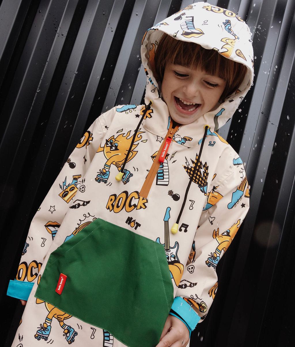 Poncho de pluie enfant crème imprimé musique poche verte capuche Hello Hossy