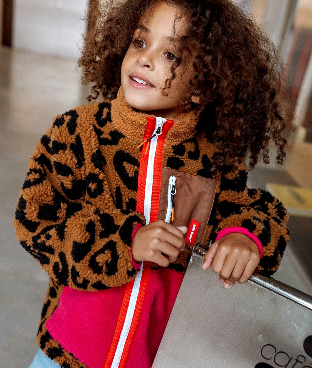 Veste polaire enfant imprimé léopard vue de face Hello Hossy
